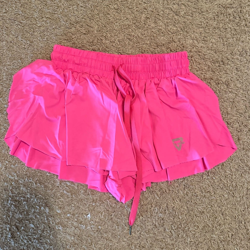 Kiki Kona, hot pink shorts